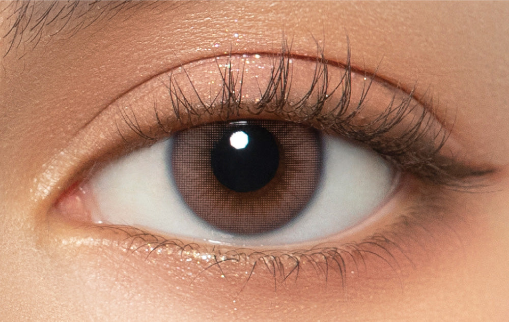 カラーコンタクトレンズ、MerMer ジェムピンク | 1dayを装用した状態の目のアップ画像